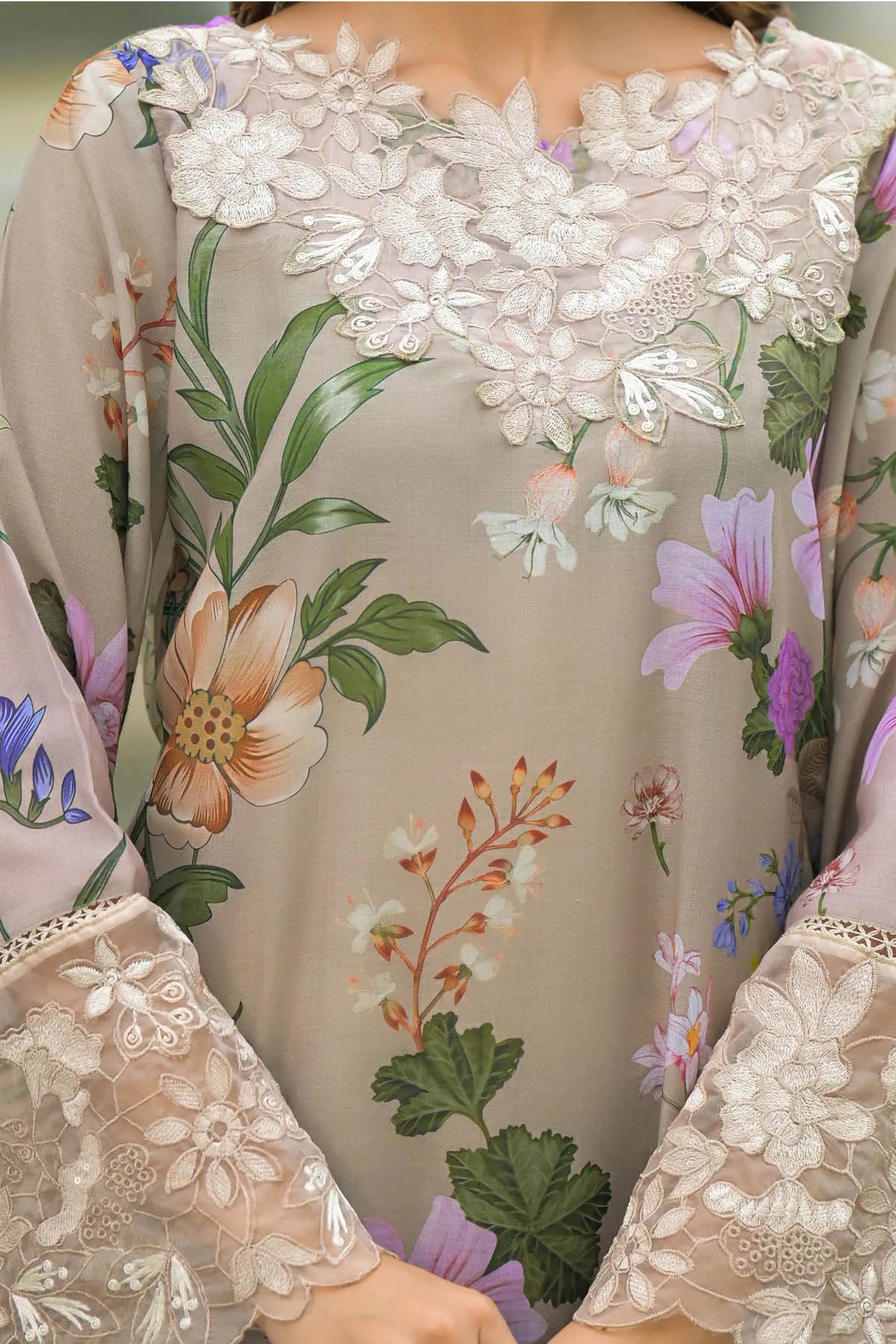 Floral and lace detailed garment with a neutral background