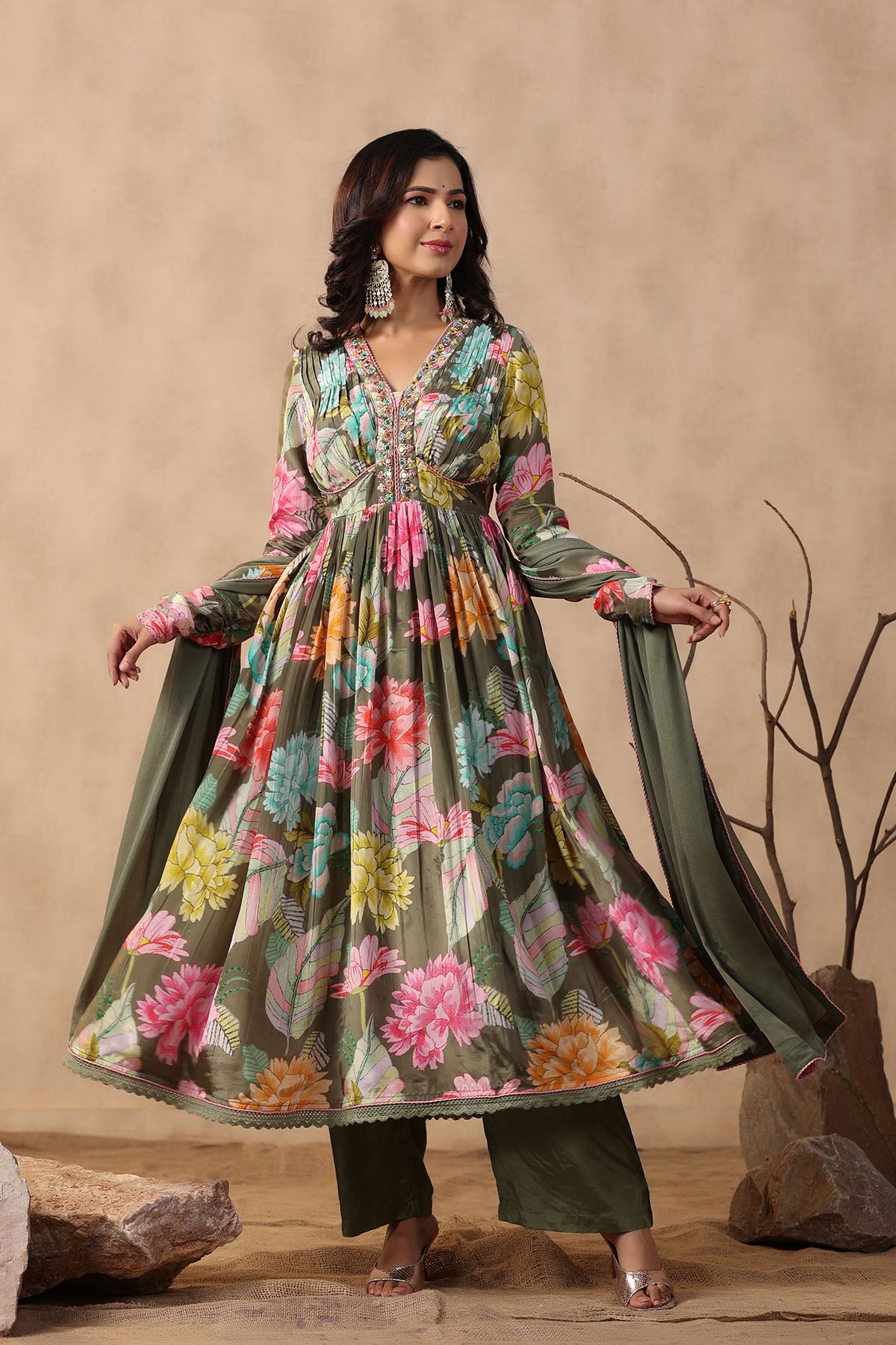 Woman wearing a floral dress with a beige background