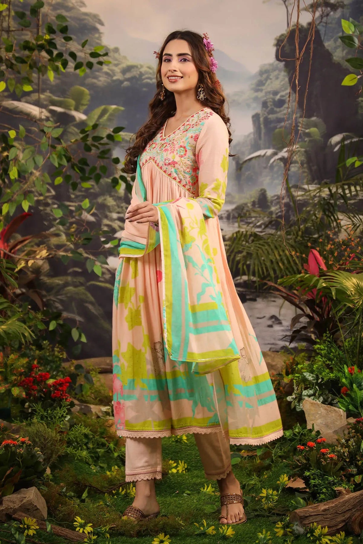 Woman in a traditional outfit standing in a lush, animated jungle setting