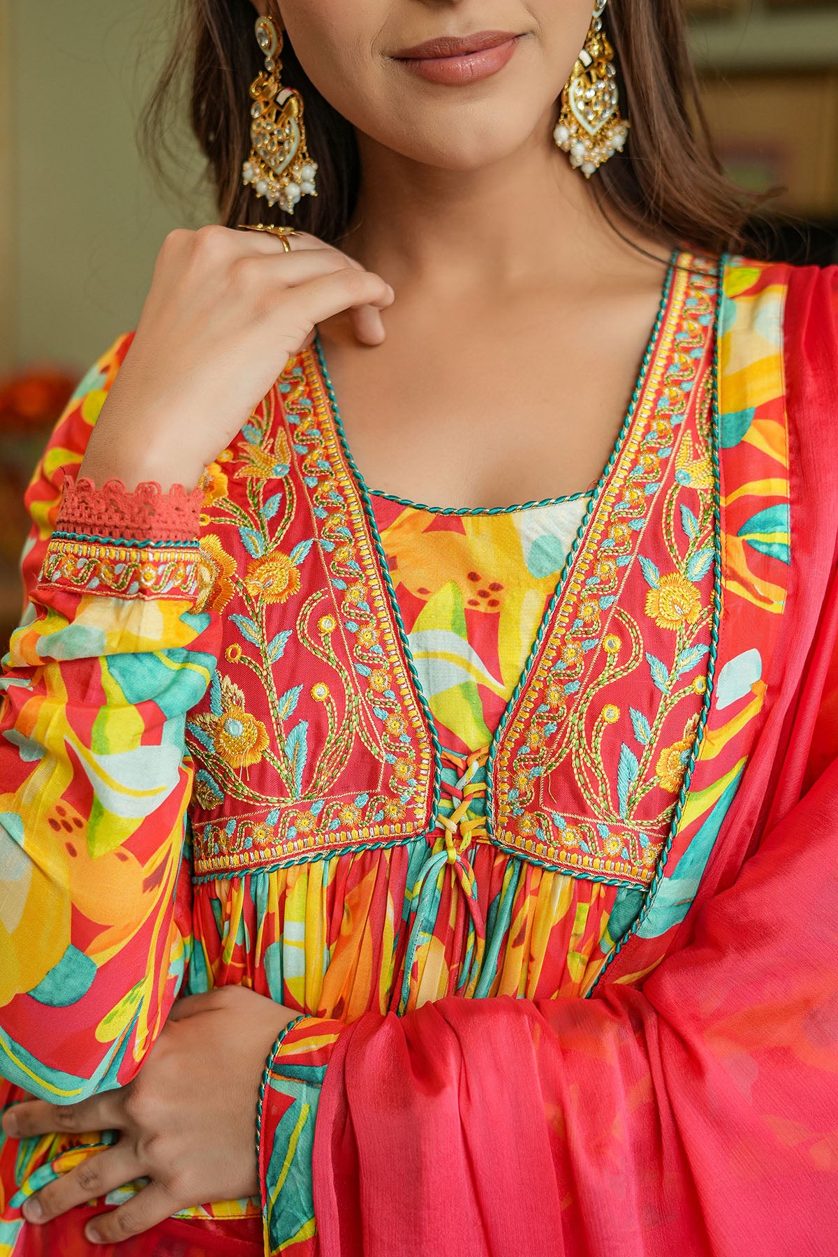 Colorful traditional outfit with intricate patterns and embroidery.