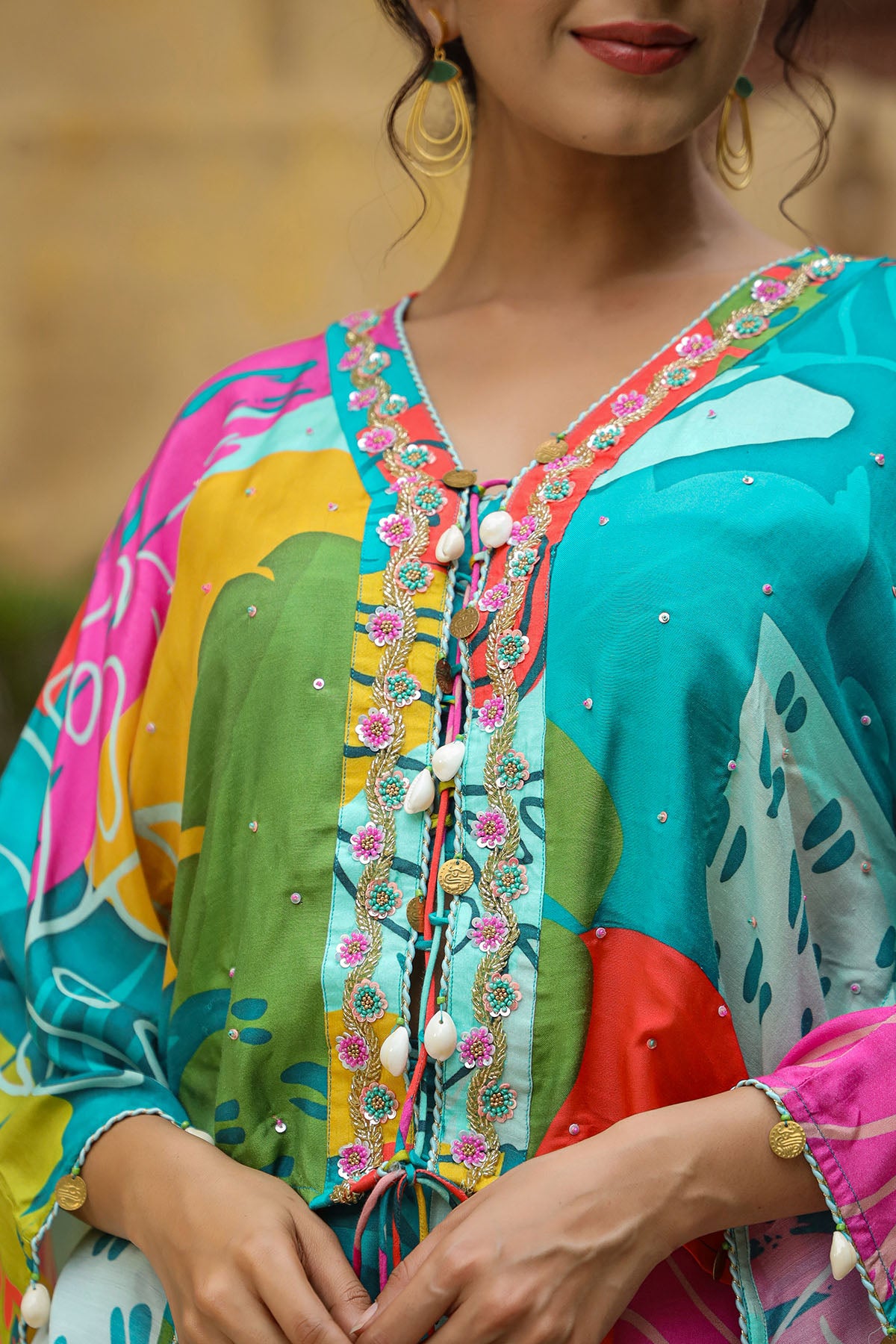 Colorful traditional outfit with intricate patterns and embroidery.