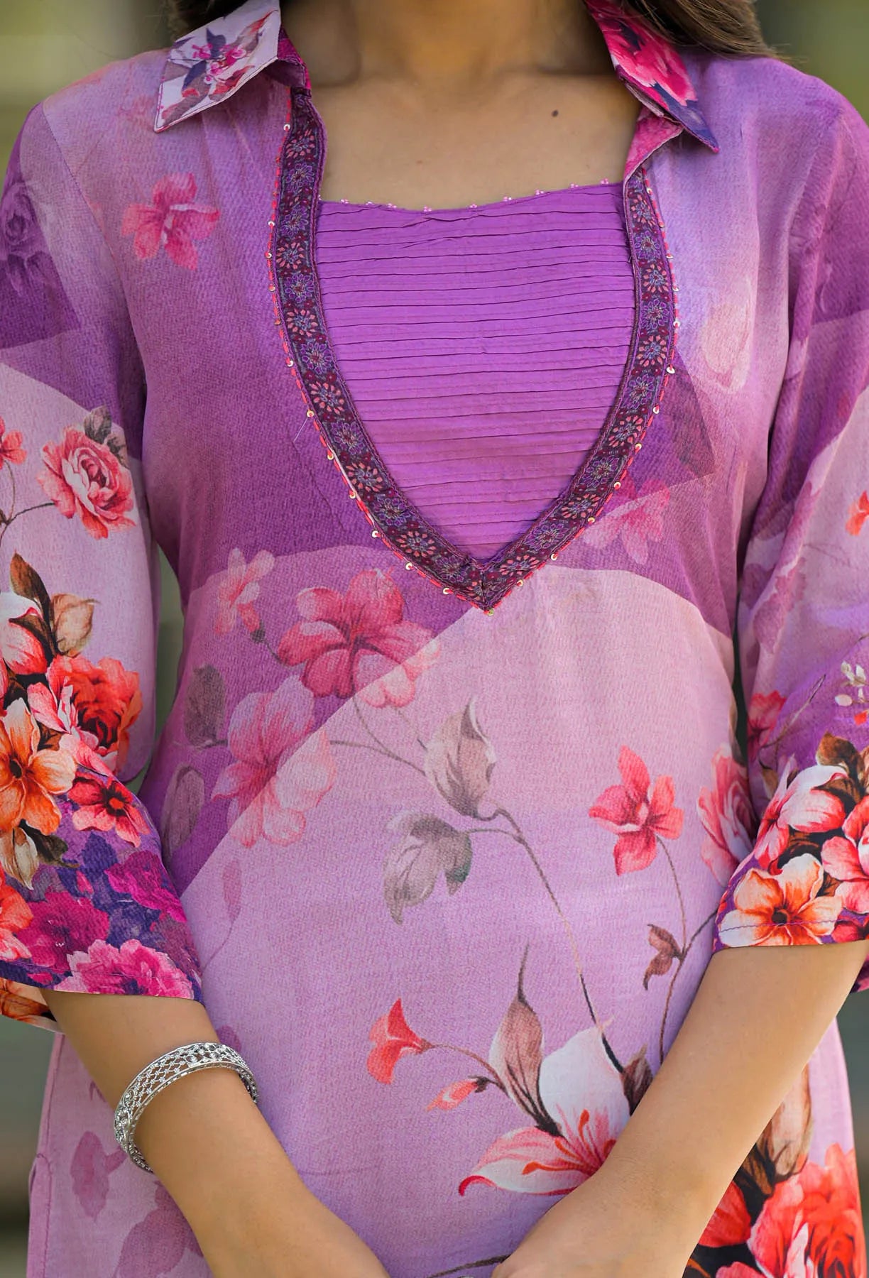 Purple floral dress with a close-up of the fabric and design.