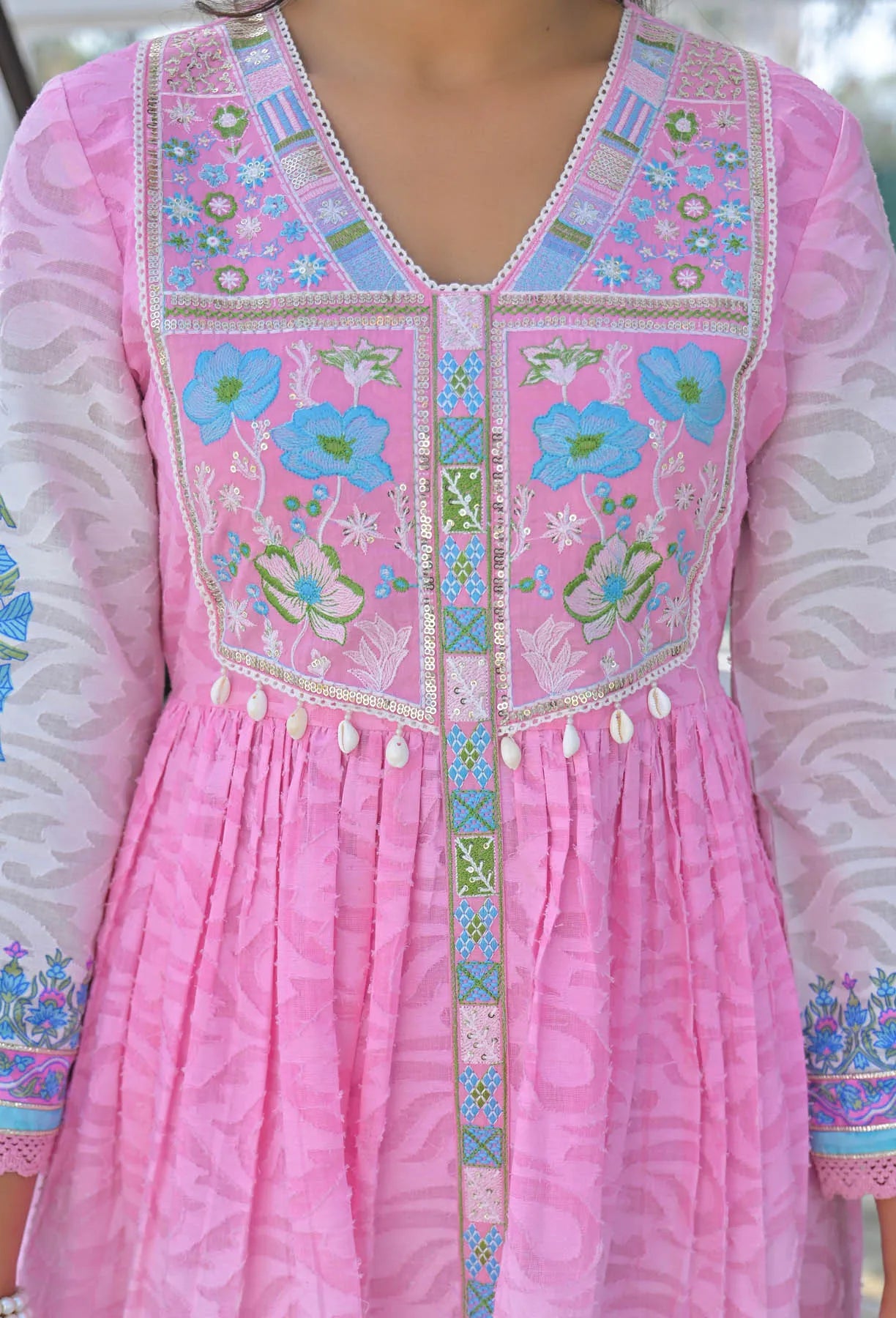 Pink traditional dress with floral embroidery
