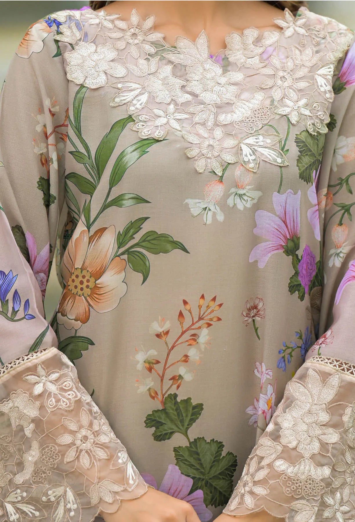 Floral and lace detailed top with a focus on intricate patterns.